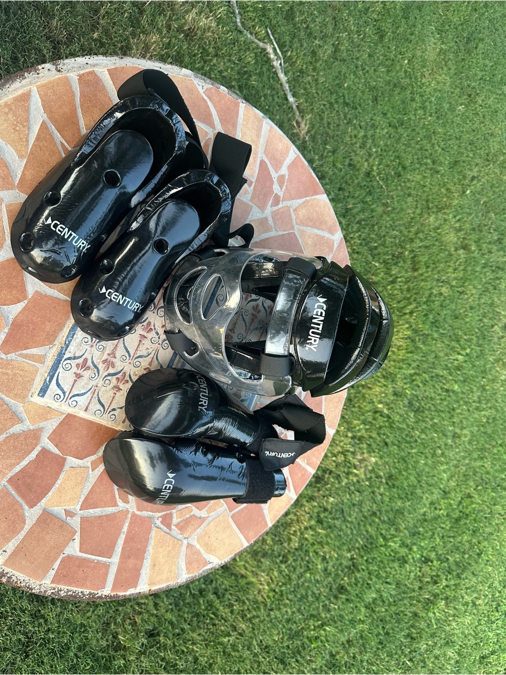 Century sparring gear includes a helmet, gloves, and foot guards. Size Med